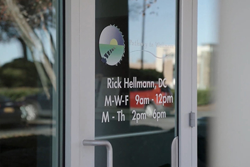 Door Showing Clinic Hours of the Best Chiropractor Offering Wellness Services Near Rock Hill SC