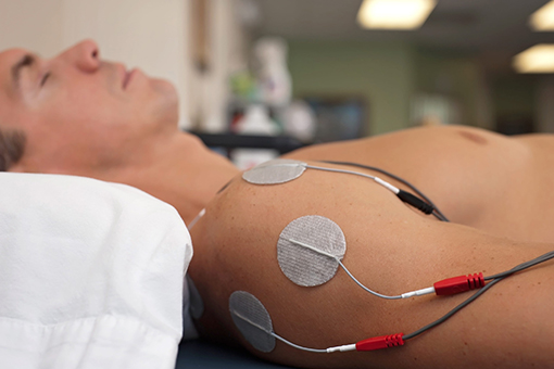 Man Lying on the Bed of Fort Mill Clinic For Hako-Med Therapy