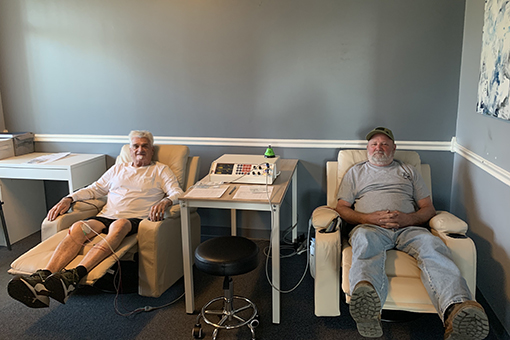 Two Fort Mill Men Smiling While Receiving Hako-Med Therapy